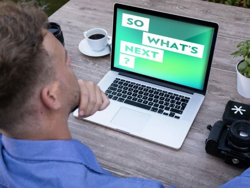 whats next man on a laptop