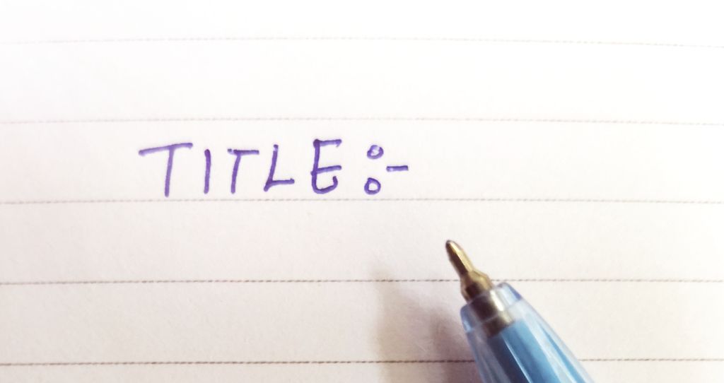 Pen that has just written the word TITILE